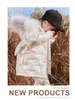 귀여운 어린이 다운 재킷 패션 디자인 PU 중형 스타일 순수한 컬러 소녀 코트