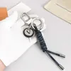 Diseñador de moda amantes del llavero Key Beba de llave de lujo de cuero llavero de cuero hecho a mano para hombres Bolsas para mujeres Costilización Keyri9416372