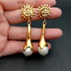 YYGEM 12x38MM White Nucleated Flameball Baroque Pearl Yellow Gold color Earrings
