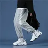 Męskie spodnie E-BAIHUI jesienne proste spodnie dresowe jednokolorowe sportowe męskie modne luźne proste nogawki multi-button beamed casualowe spodnie