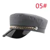 Bottone a catena in metallo Berretto in pelle nera PU Cappelli blu scuro Berretti piatti alla moda