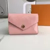 Monedero de cuero genuino de alta calidad Diseñadores de lujo Bolso de moda Hombres Monederos de mujer gratis Titulares de tarjetas de piel de cordero negro Mini carteras Ranura interior de bolsillo para llaves