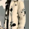 Abrigo de piel sintética para mujer otoño invierno blanco y negro vaca rayas imitación visón Prendas de abrigo de lana de gama alta suelta peluda cálidamente espesar felpa de manga larga Acolchado