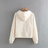 Kvinnors tröjor Xiao Lu 52-6105 European och American Fode Pocket Hooded Fleece