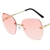 Mode Kvinnor Solglasögon Rimless Sun Glasses Trimming Goggles Anti-UV Spectacles Gradient Färglins Adumbral A ++
