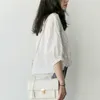 Mode printemps coréen été à manches courtes haut pour femme lâche solide blanc brodé creux col en v chemise femme 8025 50 210527