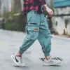 Moda Uomo Jogger Hip Hop Camouflage Tasche laterali Pantaloni sportivi da uomo stile sciolto High Street Pantaloni con risvolto casual Pantaloni cargo Mid H1223