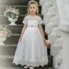 2021 Bohemian Flower Girls Abiti Battesimo Maniche corte Perline Fusciacca Pizzo Rustico Abiti da prima comunione per bambini piccoli Infant Toddler Birthday Floor-Length