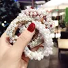 Korea Dongdaemun ins Japanese Korean version of simple pearl beaded hand-woven head rope rubber band hair tie female