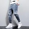 Męskie dżinsy streetwear Hip Hop Cargo Pants Elastic Harun Joggers z jesieni i wiosenne tkaniny 5xl