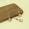 Ensemble de boucles d'oreilles et collier en pierre de cristal blanc exagéré pour femmes, ensemble de bijoux géométriques style Boho pour fête de mariage
