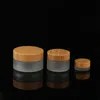 High Quality 5g 10g 15g 20g 30g 50g 100g Frosted Candle Jar with Wooden Lid Wholesale Skin Care Body Butter Food Grade Honey Storage Glass Container Freeship