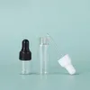 Garrafas do conta-gotas de vidro vazias 1ml 2ml 3ml 5ml Líquido claro dos óleos cosméticos do vial com tampão branco preto