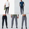 Designer calças compridas homens esporte correndo alinhar yoga ao ar livre ginásio bolsos fino ajuste lu sweatpants pant jogger calças dos homens casuais elast251w