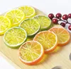 Forniture per feste 5 cm Simulazione di frutta artificiale Fette di limoni Frutta di Natale Ornamento Cucina Matrimonio Decorazione di limoni finti SN2409