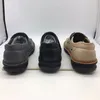 Fashionabla lädersandaler för män coola gentlemanden tofflor i sommar högkvalitativa slip-över sandaler med ihåliga design Mäns sandaler