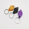 Mini LED Latarka Keychain Przenośny Outdoor Party Light Latarka Key Ring Emergency Camping Lampa Plecak W0137