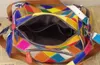 レザーレディースカジュアルパッチワーク幾何学デザインメッセンジャーショルダーバッグファッション女性のカラーブロックトートバッグ