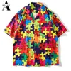 Puzzle coloré imprimé chemise à manches courtes hommes été plage hawaïenne pour hommes japonais Streetwear Hip Hop bouton Up hommes chemises décontractées