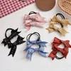 1 paire nouveau japonais Simple mignon rayures tissu arc élastique cheveux corde douce fille enfants mode queue de cheval cheveux accessoires