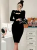 Herfst chique mode zwart gebreide jurk elegante vrouwen lange mouwen uitgehold bodycon party potlood 210529