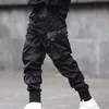 Мужские брюки Мужские хфуфлашор мужски ленты цветовые блок черный карман груз 2022 Harem Joggers Harajuku SweatWant Hip Hop Bloys