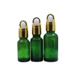 Bouteille d'huile essentielle en verre vert or couvercle de panier en argent flacons compte-gouttes en caoutchouc blanc contenant d'emballage cosmétique bouteilles de remplissage 5 ml 10 ml 15 ml 20 ml 30 ml 50 ml 100 ml