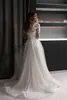 Incredibile abito da sposa in tulle con paillettes a maniche lunghe a linea illusione Abiti da sposa con bottoni posteriori