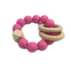 Bracelet de dentition pour bébé Jouets de dentition Sucettes Chew Bite Soins des dents du nouveau-né Perles Bijoux Soulagement de la douleur Anneaux en bois de silicone pour bébé ZYY876