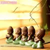 XINCHEN Ceramic Crafts Creative Home Decoration Living Room Feng Shui Ornaments Cute Little Buddha Zen Like Pots Furnishings 210811