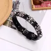 Bijoux punk Bracelet en cuir de vachette tissé Vintage chaîne transfrontalière nouveau brassard en cuir réglable crâne pour hommes personnalisé