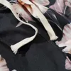 Été Hip Hop court Joggers Harajuku s Streetwear imprimé fleuri poche à glissière taille élastique piste Baggy noir 210713
