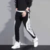Calças Homens Elásticos Sólidos Cintura Elástica Streetwear Juntos 2020 Nova Saggy Drop-Crotch Calças Casuais Masculino X0723