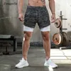 Mens Gym Sports Shorts Jogging Running Andningsbar Fitness Motion Dubbelskiktskjorta Hidden-Pocket Casual Shorts X0705