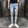 Оптовая продажа 2021 мода большие коленные отверстия социальные люди джинсы мужские нищие разорванные брюки духовного парня длина лодыжки карандаш брюки мужские