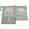 Sacos de armazenamento 1 PCS Sapatos à prova d'água para viagens portáteis Organize Organizador de cordão não tecido