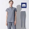 Medigo 022 styl kobiety Scrubs topy + spodnie mężczyźni mundur szpitalny chirurgia Scrubs koszula z krótkim rękawem mundur pielęgniarski Pet grey's anatomy Doctor odzież robocza