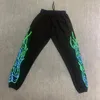 Young Thug Sp5der 55555 pantalons femmes hommes flamme lettre glace soie imprimé pantalons de survêtement mode tendance lâche à bretelles décontracté Men's303A