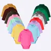 Baby Girls Bodysuits 100％コットンソフト新生児ジャンプスーツ幼児服ソリッドタートルネックパジャマシャツトップス0 1 2 3年210413