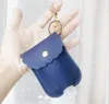 PU cuir désinfectant pour les mains bouteille Party Favor titulaire porte-clés sac avec 30 ML imprimé léopard savon porte-clés pendentifs couverture