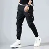 Pantaloni Hip Hop Pantaloni Harem neri da uomo Nastri multitasche Pantaloni sportivi da uomo Streetwear Pantaloni cargo da uomo Streetwear giapponese 211201