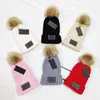 Womens Designer Winter Beanie Hat مع Pompoms Women Soft Stretch Cable Cable Pom Poms Cashmere Hats Female Warm Skull Caps Plus298W