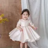 ピンクチュール生まれたばかりの赤ちゃんの女の子の花のレースのバプテスマのドレス1年間の最初の誕生日プリンセス長袖洗礼ガウンアウトフィットG1129