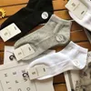 Chaussettes pour hommes dix paires de coton peigné été tube court mince couleur unie respirant bouche lâche