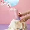 Estilo japonês Sakura garrafa térmica portátil viagens caneca de café isolado copo 304 presentes de balão de vácuo de aço inoxidável 210615
