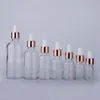 Wholesale clear serum glass dropper bottles 5ml 10ml 15ml 20ml 30ml 50ml 100ml with rose gold lid for essential oils