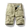Letnie Casual Cargo Cotton Shorts Mężczyźni Anglia Styl Solidne Zipper Kieszenie Moda Długość kolana 28-38 Mężczyźni