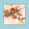 Juldekorationer Festligt partiförsörjning Hem Trädgård Mini Gingerbread Man Ornaments Deer Snowman Chrismas Tree Pendant Decoration År