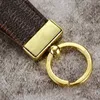 Keychain Straps Key M172A Bulldog Key Leather Fashion Female Mens Cute Long Golden Official Original Luxury With Ll Brand