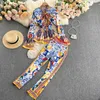 Moda de pasarela elegante estampado Vintage traje de pantalón blusa con volantes camisa Top y pantalones largos conjunto de dos piezas conjuntos de mujer 60UA